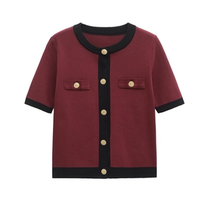 Elegant wine red knit cardigan with contrast black trim and decorative gold buttons