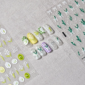 Embossed lily of the valley nail art stickers with elegant floral and plaid patterns