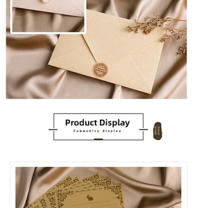 Lace cutout rabbit greeting card with linen texture envelope on champagne silk