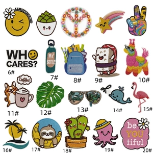 Detail view of 20 assorted cartoon cactus and animal embroidery patches for DIY decor