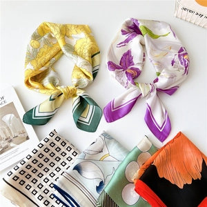 Elegant silk-like square scarf for women featuring diverse floral and geometric patterns