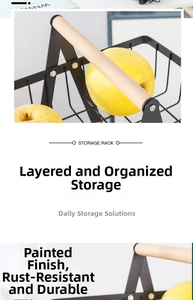 Detail view of double-layer metal fruit basket with wooden handle and rust-proof finish