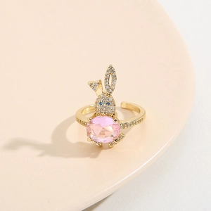 Cute bunny ring with pink gemstone and micro-pave zircons on a gold-plated band