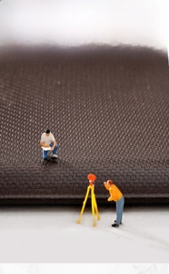 Macro shot showing 19mm thick anti-fatigue PU leather kitchen mat with woven texture