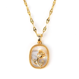 Detail of vintage gold necklace with white shell inlay and 3D rose flower pendant