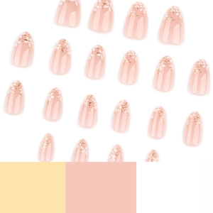 Faux ongles amande courts avec motifs de fleurs blanches et feuilles d'or roses