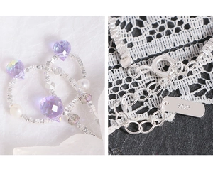 Close-up of S925 sterling silver clasp with purple crystal and pearl on bracelet