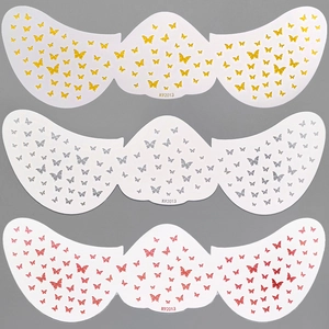 Detailed view of butterfly facial freckle tattoo stickers in gold, silver, and pink metallic finish