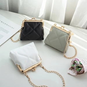 Quilted mini chain purse with vintage gold clasp in black, green, and white colors