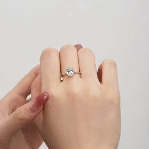 Close-up of S925 sterling silver ring with large oval-cut gemstone on a model's hand