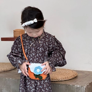 Handmade crochet orange flower crossbody bag for children with white floral flap cover