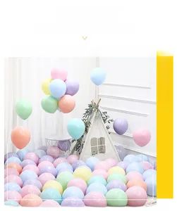 Pastel macaron party balloons set with Nordic style play tent for birthday room decor