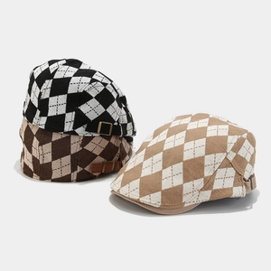 Classic diamond checkered newsboy caps in black, brown, and beige with adjustable buckle