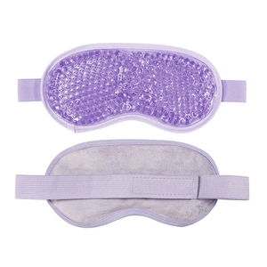 Detail view of purple cooling gel eye mask showing dual-sided plush and gel bead texture