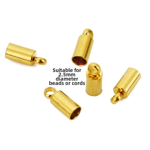 Close-up of 5 gold 2.5mm stainless steel cylinder clasps for jewelry making and cord ends