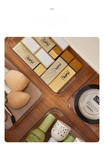 Close-up of clear acrylic drawer organizer divider with separate storage compartments