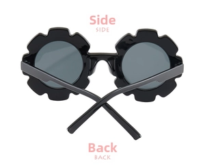 Detail view of flower-shaped children's sunglasses with black frame and dark round lenses
