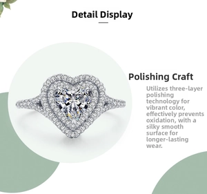 Close-up of heart-cut simulated diamond ring with double-halo micro-pave silver band