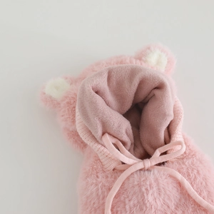 Close-up of pink plush hood with cute bear ears and soft warm lining for kids