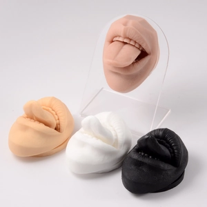 Silicone mouth model for piercing practice in four skin tones with transparent stand