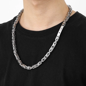 Detailed view of silver Byzantine chain with heavy-duty clasp on model neck