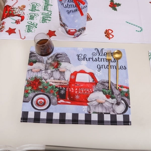 Christmas gnome placemat and cutlery set with red truck and forest prints for dining decor