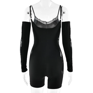 Detail view of black bodysuit back with lace trim and matching long sleeves on mannequin