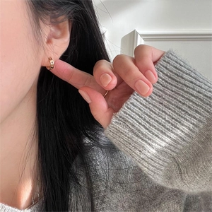 Minimalist 925 sterling silver heart hoop earrings in gold finish for elegant daily wear