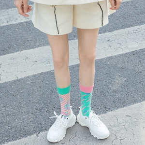 Detail of colorful asymmetric cotton mid-calf socks with creative cartoon patterns