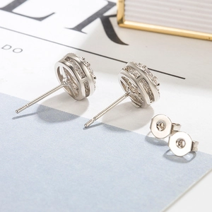 Classic round hip-hop stud earrings in silver metal with H-shaped hollow design and cubic zirconia