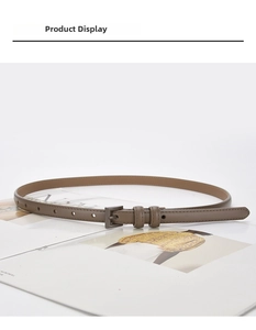 Close-up of taupe leather skinny belt with matching square buckle and fine stitching