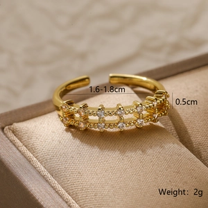 Macro detail of gold plated adjustable ring with two rows of sparkling cubic zirconia