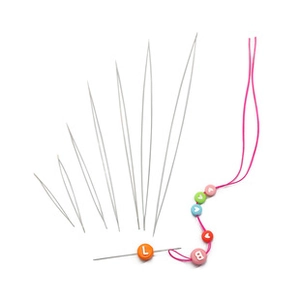 Detailed macro of assorted big eye beading needles with pink elastic cord and colorful beads
