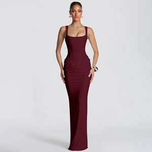 Detailed ruching and U-neckline of a slim-fit burgundy evening dress for parties