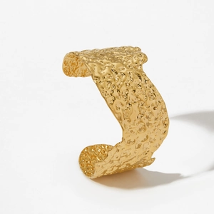 Adjustable wide gold-plated stainless steel cuff bracelet with irregular hammered texture