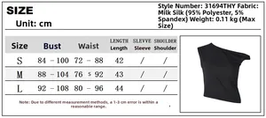 Tableau des tailles pour crop top noir asymétrique avec mesures détaillées en centimètres