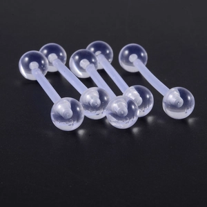 Five translucent acrylic barbells tongue rings on a dark background for body piercing