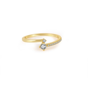 Detail of gold criss-cross ring with double round stones and pavé set small diamonds