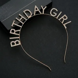 Golden Birthday Girl rhinestone headband accessory on black display box for celebrations