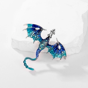 Broche dragon vintage en argent avec ailes en émail bleu dégradé et cristaux