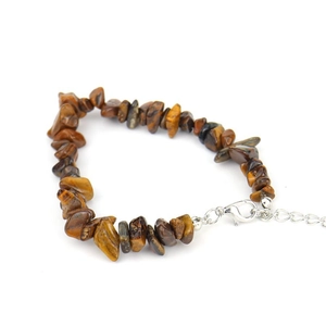 Macro detail of natural tiger eye crystal stone bracelet with adjustable lobster clasp