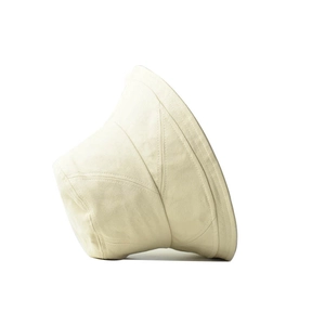 Minimalist cream cotton bucket hat with geometric stitching for sun protection
