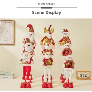 Group of Christmas plush dolls with sequin outfits featuring Santa, reindeer and snowman