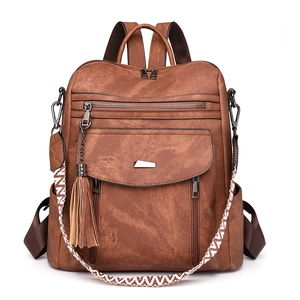 Zaino vintage da donna in pelle PU marrone con tracolla etnica e ciondolo nappa