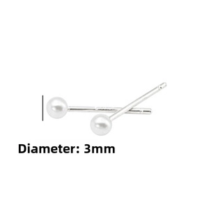 Close-up of 3mm minimalist silver ball stud earrings showing diameter measurement