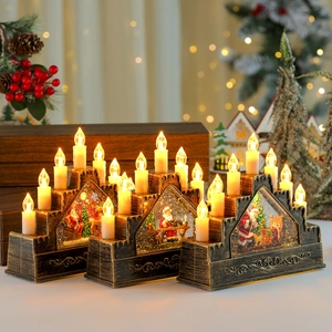 Vintage bronze Christmas candle bridge set with festive Santa scenes and warm LED lights