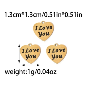 Detailed view of three 1.3cm gold heart pendants with I Love You engraving