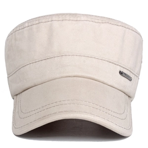 Close-up of beige cotton cadet cap with metallic decorative plate and reinforced stitching