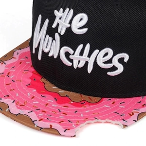 Flat brim baseball cap with the Munchies 3D embroidery and donut bite-mark brim design