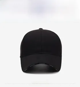 Close-up of black baseball cap with 3D BLACK embroidery and FASHION lettering